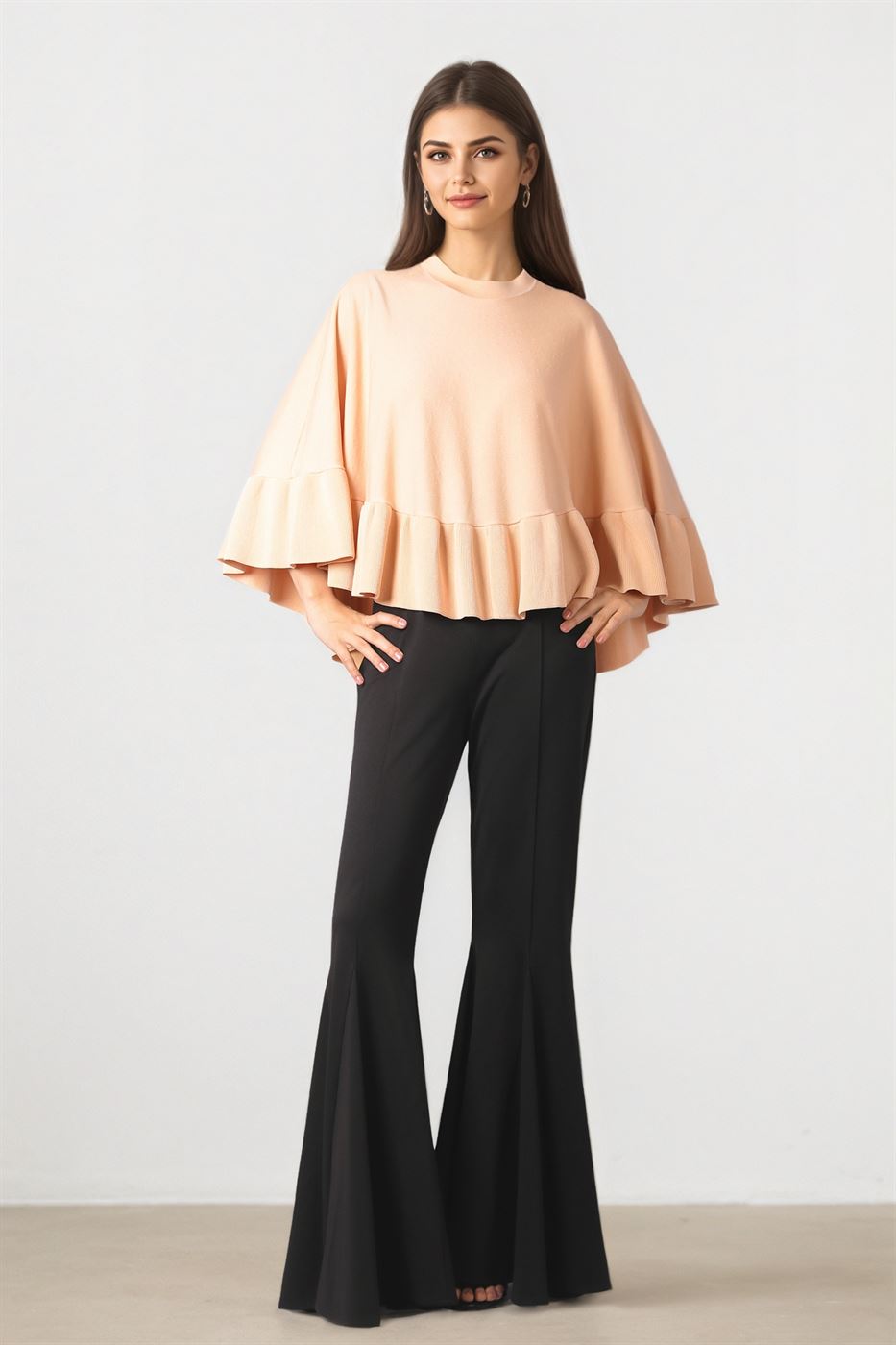Ruffled Elegance Knit Cape
