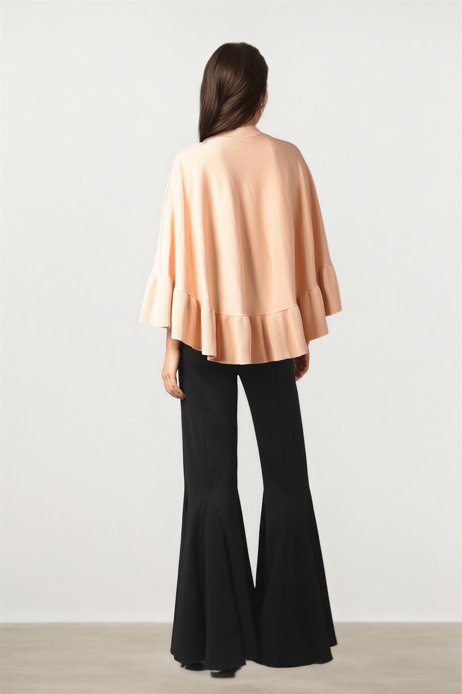 Ruffled Elegance Knit Cape